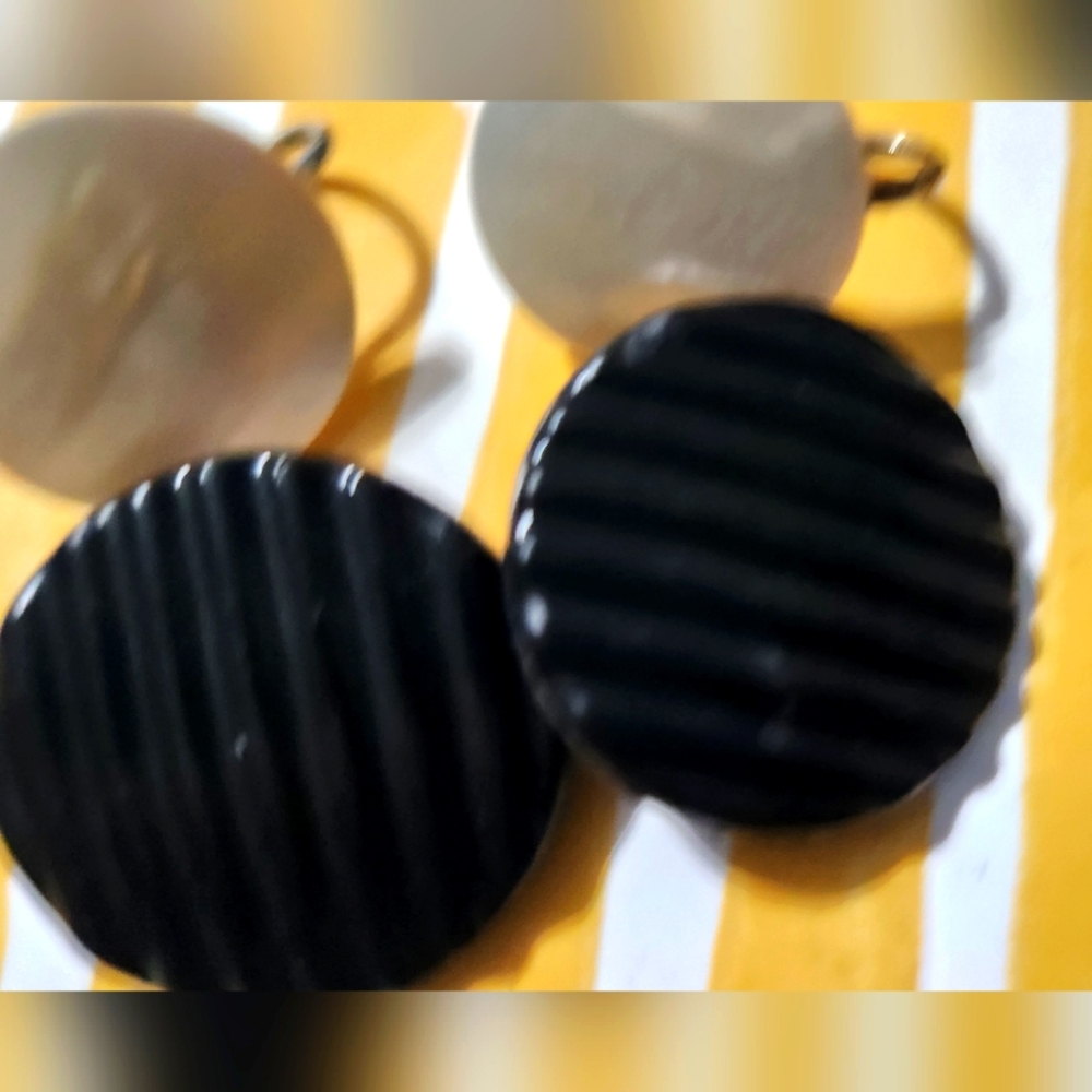 Elegant Black Clip On Earrings and A Pair Of White Clip On Earrings